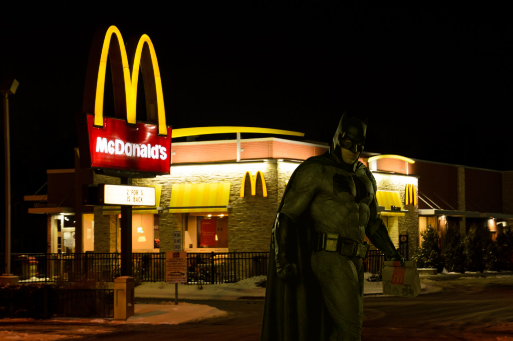This image has an empty alt attribute; its file name is batman_outside_mcdonalds.png